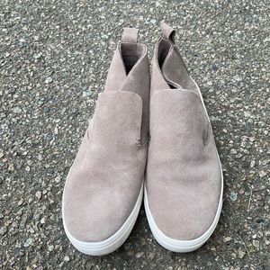 Tan pair of ankle booties